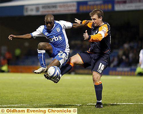 FEBIAN Brandy is put under pressure by captain Sean Gregan in Athletic�s League One fixture at Gillingham in November. The challenge led to a penalty. 