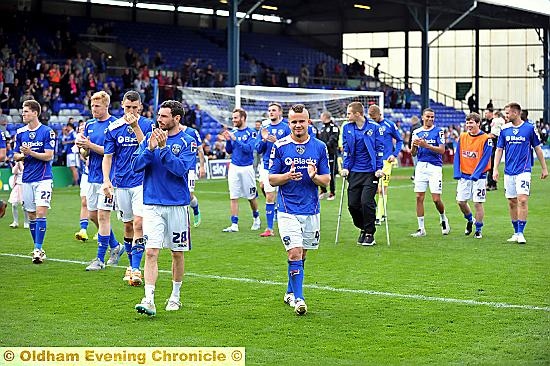WILL HE STAY OR WILL HE GO? . . . James Wesolowski (right) and his Athletic team-mates applaud the fans after the last game of the season against Notts County on Saturday. Wesolowski is mulling over the verbal offer of a new contract. 