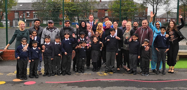 Parents, pupils and staff outside Clarksfield Primary