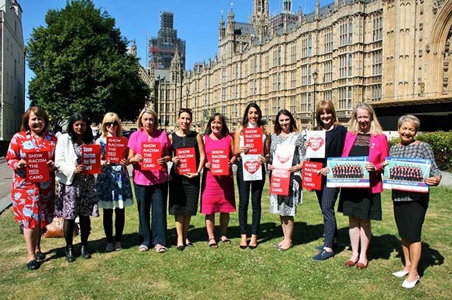 The MPs joining Debbie Abrahams in supporting Show Racism the Red Card are, left to right: Thelma Walker, Rupa Huq, Rosie Duffield, Barbara Keeley, Debbie Abrahams, Rosena Allin-Khan, Melanie Onn, Sarah Jones, Liz McInnes, Rosie Winterton. 