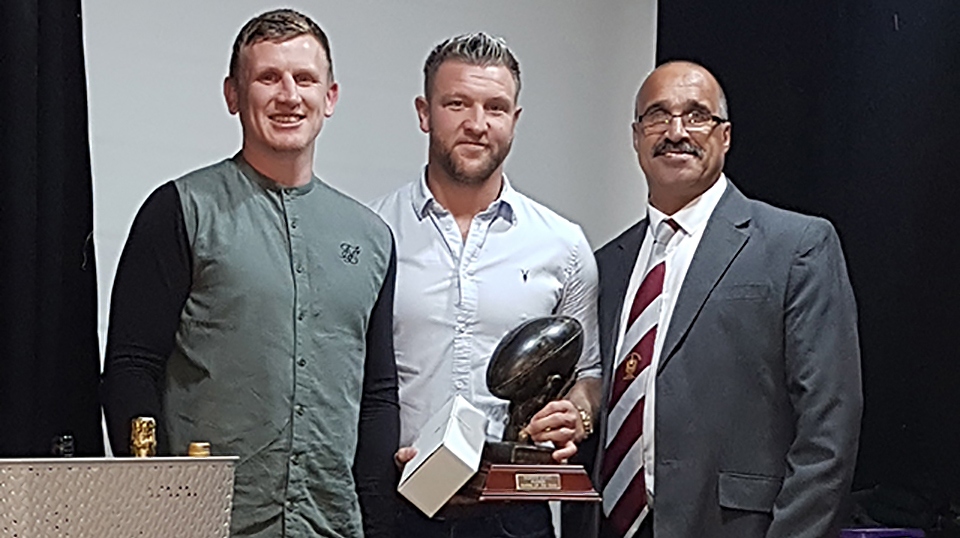 Ritchie Hawkard (centre) won two awards, voted top gun by his fellow players and by the coach. He's flanked by club captain Gareth Owen and Joe Warburton of the Past Players, who sponsored the players' award