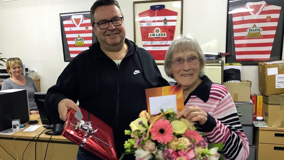 Clarice pictured with Roughyeds chairman Chris Hamilton at her surprise 90th birthday party at the club.
