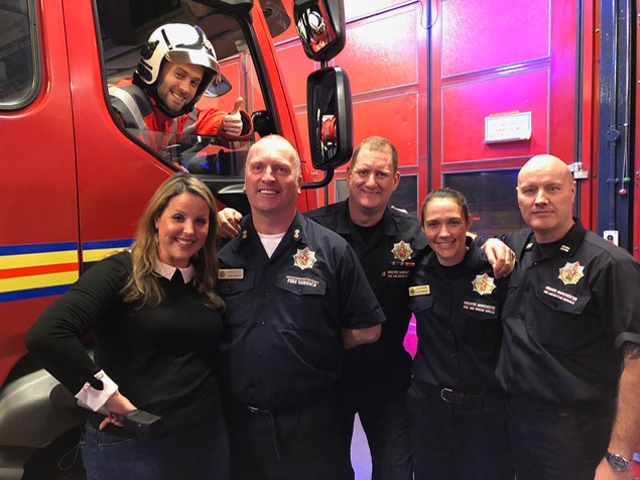 Chef Adam Reid with presenter Vicky Grimes, Watch Manager Mark Bamford, Firefighter Pete Griffiths, Firefighter Kate Lonsdale and Crew Manager Dave Dodson