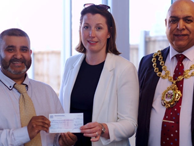 Maruf Ali from SPARC, Jenn Sutton from Wiggett Homes and the Mayor of Oldham, Councillor Javid Iqbal.