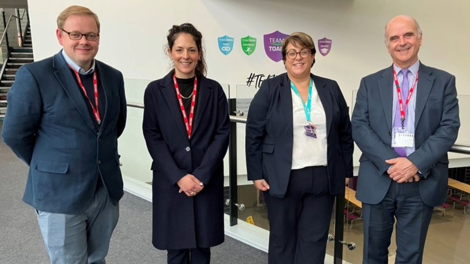 Oldham Academy North Headteacher Jessica Giraud is pictured (second from right) with the Eton Connect representatives