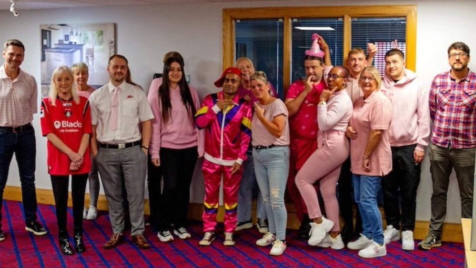 Some of the HPP team that took part in Wear it Pink day, including Area Sales Manager Shankar Das in his bright pink, shiny shell suit!