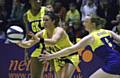Rachel Henry (left ) attempts to get round the Team Bath defence. 