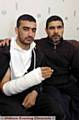 BADLY beaten . . . Zafar, left, and Sikander 