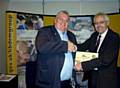 CONGRATULATIONS . . . Oldham Council leader Howard Sykes, left, receives the housing award from Richard Kemp, Liberal Democrat leader of the Local Government Association 
