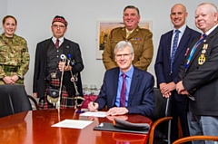 Sir David Dalton, chief executive of the Northern Care Alliance, signing the covenant