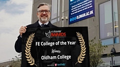 Alun Francis, Oldham College Principal and Chief Executive, is pictured celebrating the ‘FE College of the Year’ Award 2021 from Edufuturists