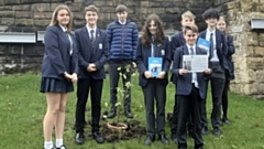 Year 10 students at the poignant tree-planting ceremony