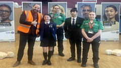 Pictured are: Vice Principal Lee Haughton congratulating Mally (Y8 Waterhead Academy Student) on becoming the 15,000th person in Greater Manchester to be trained as part of the ‘Three Ways to Save a life' campaign, along with Shannon (Y11 student and St John Ambulance Facilitator) and Hamza (Year 11 Prefect) who helped to plan the training event