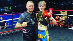 Luke Mattinson is pictured with Issan Gym head coach Ste Donnelly