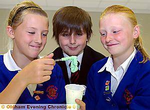 THAT’S THE WAY TO DO IT . . . . Leah Briars (Whitegate End), Aaron Phelan (Radclyffe), and Amy Mottershead (Whitegate End) turn school glue into slimeballs 