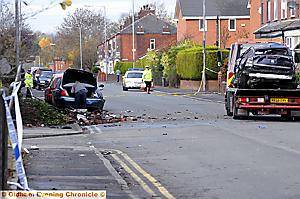 The wreckage is removed from the scene of the accident