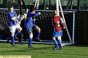 JOE Wilson (number two) scores one of his four goals.
