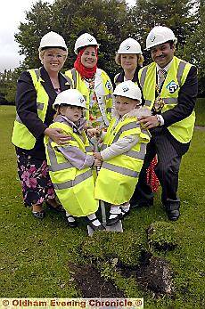 Work begins on new Royton Hall Primary School site. Back row l-r, Cllr. Kay Knox - Cabinet Member for Children, Young People and Families, Mayoress Shafeena Kausar, Jane Wilson - head teacher, Mayor Cllr. Shoab Akhtar. Front row, Holly Adlen (left) and Ka