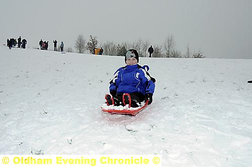 SLIP-sliding . . . Callum Tomlinson on his sledge 