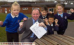 school clough hodge primary cavanagh oldham marks samuel christy ofsted allcock receives bennett neil junior teacher george head left right