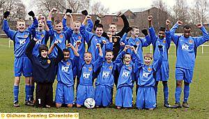 GIVE US A CHEER: Oldham Schools under-14s celebrate after winning the Greater Manchester Schools’ League. 