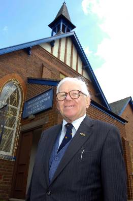 52 years of commitment . . . the Rev David Joynes outside Beulah Baptist and United Reformed Church. Picture copyright Oldham Evening Chronicle 