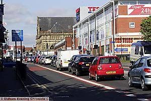 CARS queued bumper to bumper along Huddersfield Road as shoppers eager to have a glimpse of the giant new Tesco Extra store took to the streets in their masses yesterday. 