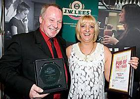 CHEERS . . . Brian and Angela Shuttleworth, from the Hunt Lane Tavern, celebrate their win 