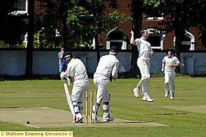 SHEER JOY: Heywood’s Lee Grogan punches the air in delight after forcing Werneth batsman Alan Durose to play on to his stumps. 