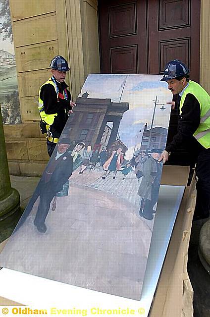 PREPARATION: Specially-created panels fill the windows on the old hall 