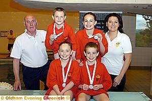 DIVING SUCCESS: Left to right, back: coach Geoff Eccles, Anthony Harding, Kendel Latham, coach Louise Bishop. Front: Ainsley Davies (left) and Luke Barrow. 