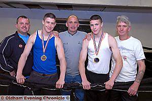 HAPPIER times in the Heffron camp. Left to right, coach Darren McCarrick, Ronnie Heffron, dad Tommy Heffron, Mark Heffron and coach Ben Lancaster. 