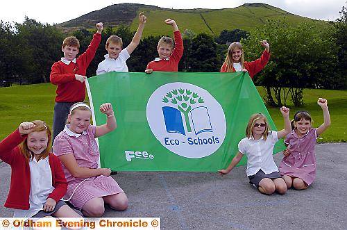 Celebrating their eco-success are pupils (back, from the left) Matthew Lait, Jake Stell, Daniel Jones, Jodie Brierley, (front, from the left) Derry Lewis, Sally Bradley, Connie Rigby and Beth Collins.