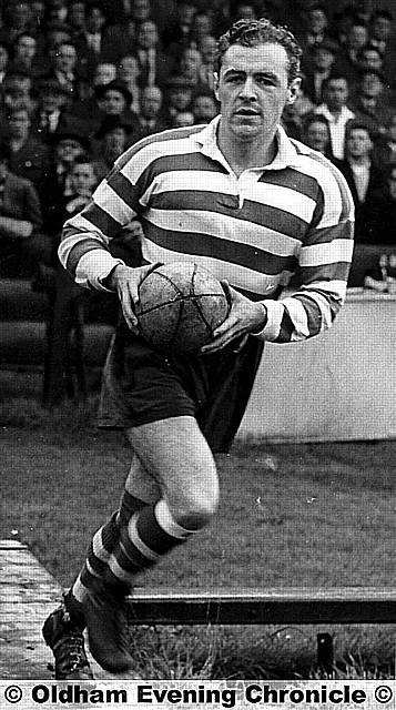 BERNARD Ganley leads Oldham out against Rochdale in 1958. 