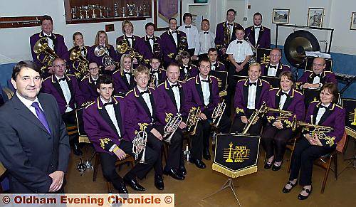 Celebration — national champions Delph Band celebrate their 160th birthday with conductor of 30 years Philip Goodwin 
