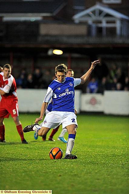 Dale Stephens reduces the deeficit from the penalty spot 