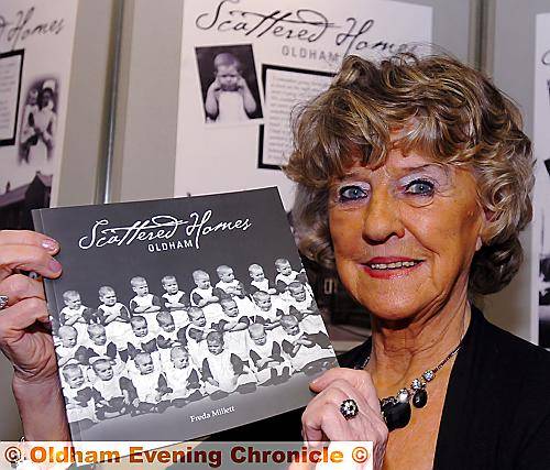 Freda Millett with her latest and final book about Oldham’s history 