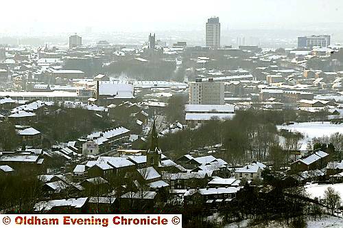 BLEAK outlook . . . a blanket of snow covers Oldham 
