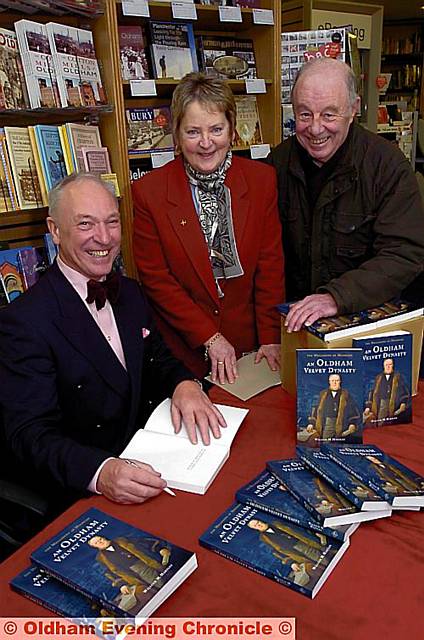 Author William Mellodew Hartley signs a copy of his book at Waterstones in Spindles shopping centre, watched by Lynn Weston, St Thomas’s churchwarden, and Peter Weston, church organist. 