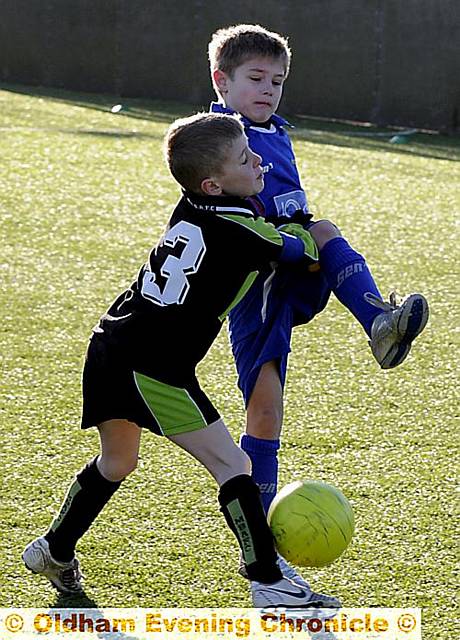 Sean Slater (top) got the other in the 3-0 win.