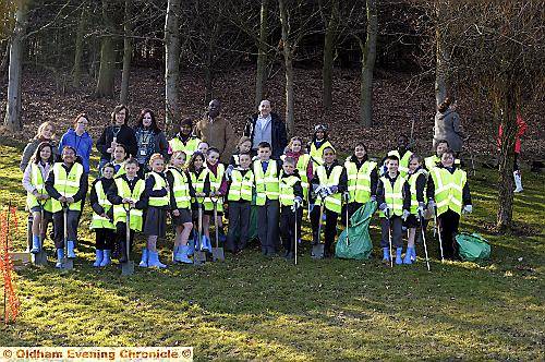 Pupils from Beever Primary School are joined by Higginshaw residents on the litter pick and bulb planting day 