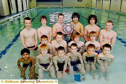 THE boys of Hulme Grammar School were crowned overall champions at the Oldham Schools Swimming Championships and the various age group performers are pictured with the trophy. 