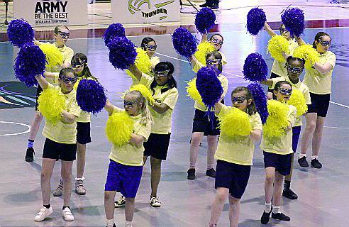 THE Holy Cross cheerleading crew take centre stage 