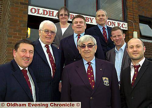 ALL SMILES: Paul Walsh Snr (vice-president), Terry Hurst (honorary member), Sue Burgess (sectretary), Roly Heptonstall (chairman), Barry Jones (president), Ian White (treasurer), Lee Roberts (comedian) and Gareth Barber (first-team captain) pictured before Oldham Rugby Union Club’s annual dinner at Manor Park. 