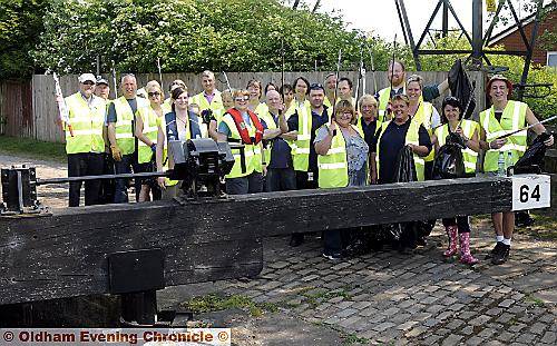 WATER clean-up . . . volunteers during the Towpath Tidy event at lock 64 on the Rochdale Canal 