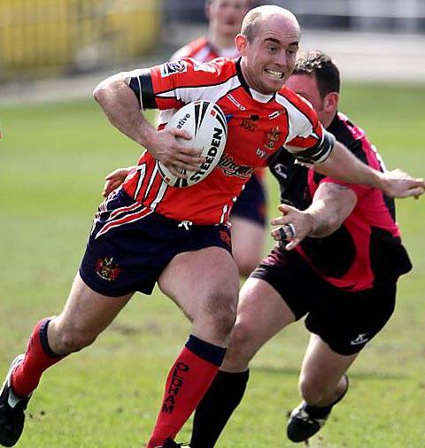 DETERMINED: Martin Roden on the run against South Wales.