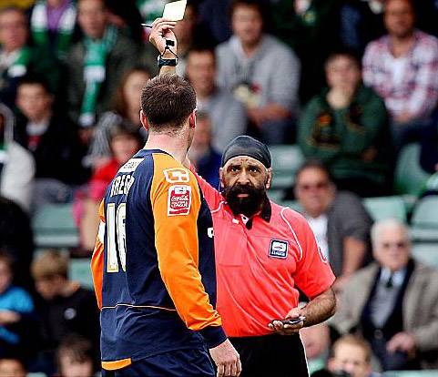 IN THE BOOK: Athletic captain Sean Gregan is booked by Jarnail Singh. It was the referee’s final Football League game. 