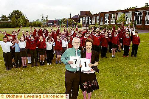 A CLASS apart . . . Martin and Cath Jones with pupils at Mayfield Primary 
