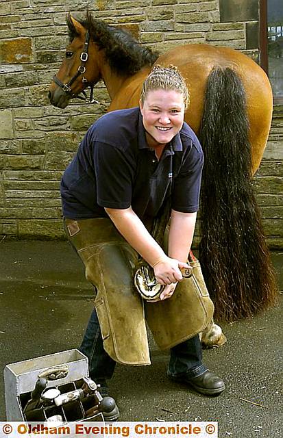 SHE’S a shoe-in . . . newly qualified farrier Deborah Connell at work 