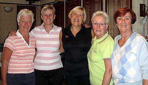 ALL SMILES . . . Janet Kershaw (left), Jane Antrobus, Oldham captain Eileen Cowell, Linda Newman and Mary Buckley. 